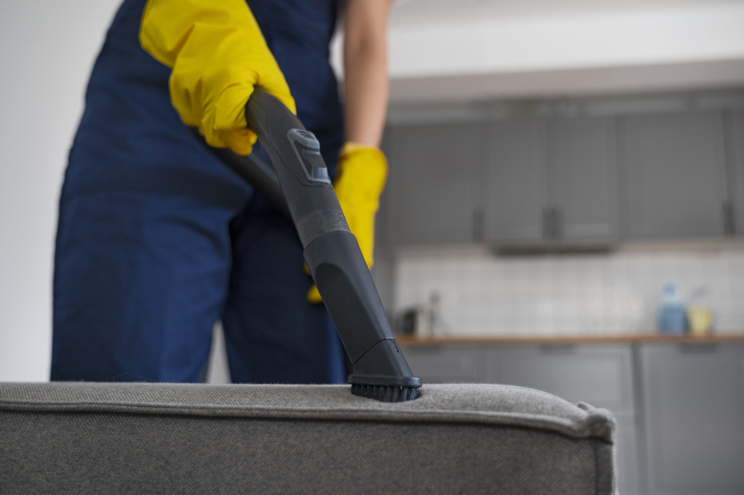front view woman cleaning home